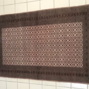 Tapis marron - franges abimee